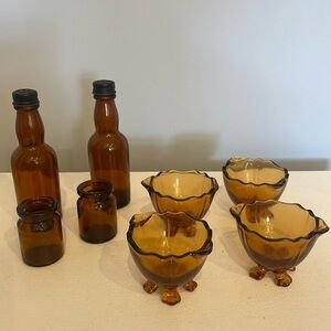 Amber glass salt/pepper shakers /mini bottles/4 foot glass egg cups vintage lot